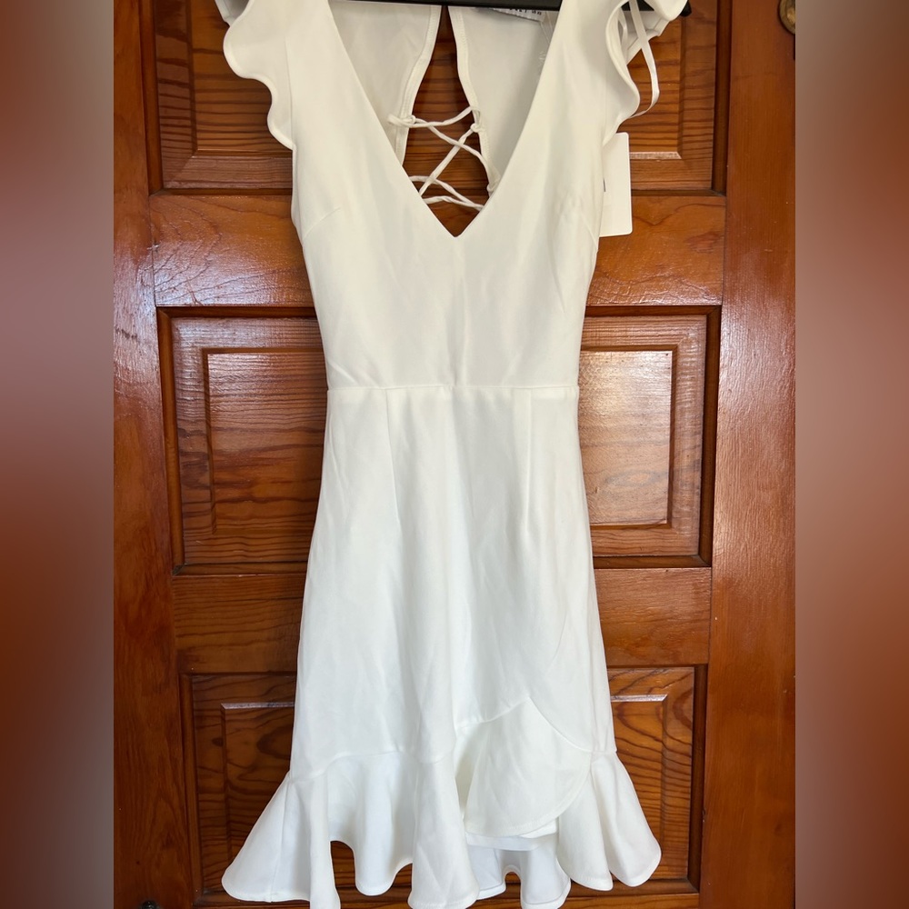 White bodycon dress from Hello Molly. Never worn and still has the tags on